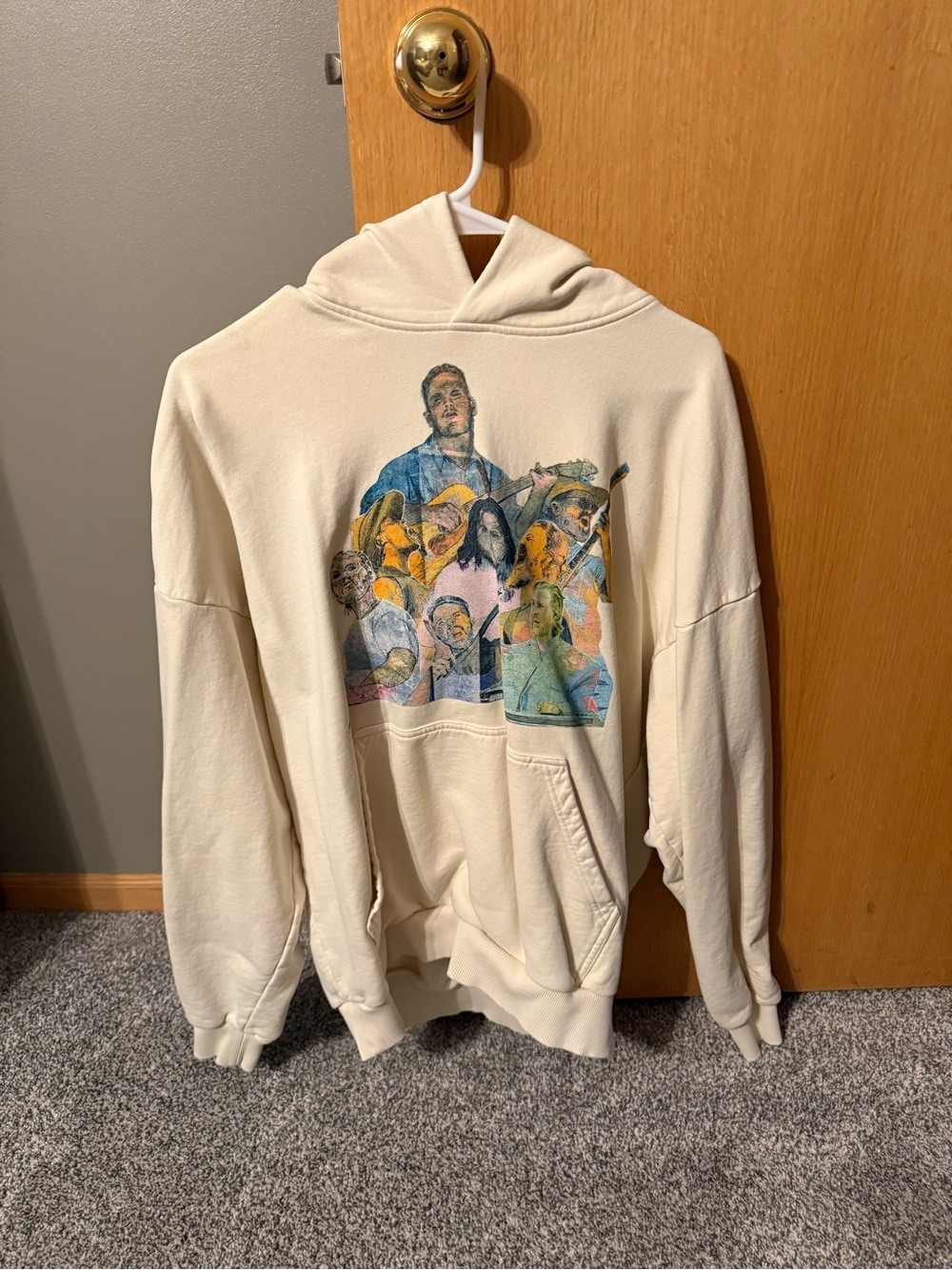 Riviera Cream Pullover Hoodie with Subtle Graphic Detail